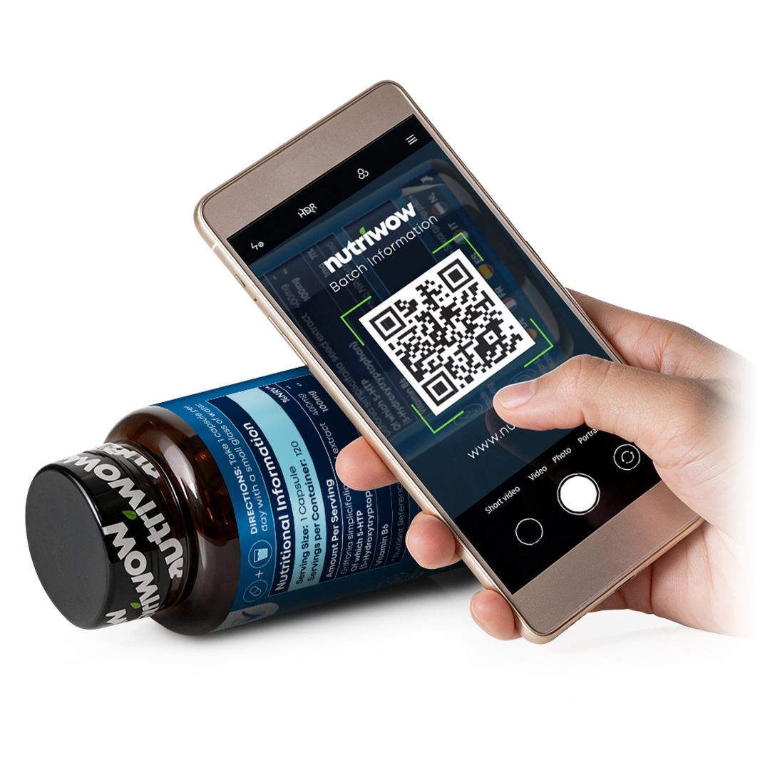 A hand scanning the QR code on a nutriwow supplement bottle with a phone